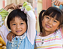 Two cute Chinese Girls Buffalo street Market, Near Yangjiawan Kunming region China