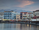 Evening light on buildings surrounding old habor Chania, Crete Greek Isles