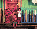 Children & Shack along the River Tortuguero, East Coast Costa Rica